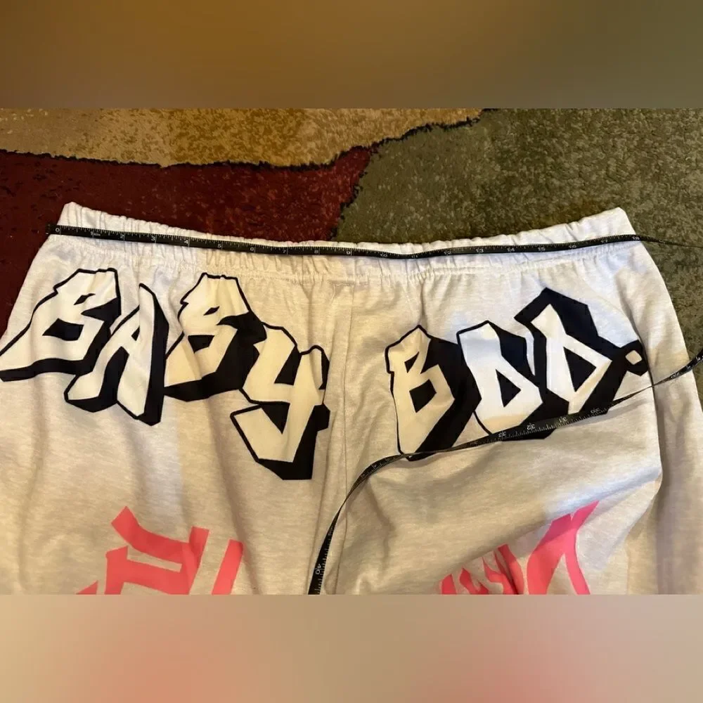 Y2K Printed joggers. Elastic at the ankle letter print with pockets. . Polyester